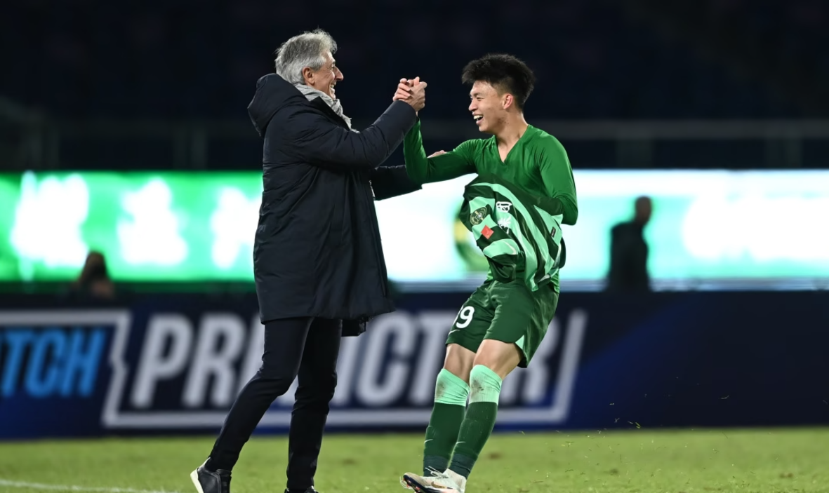 Wang Yudong (R) of Zhejiang celebrates their 4-3 win over Persib with his coach Jordi Vinyals at the Asian Football Confederation (AFC) Champions League Two at Gelora Bandung Lautan Api Stadium in Bandung, Indonesia, December 5, 2024. /Xinhua