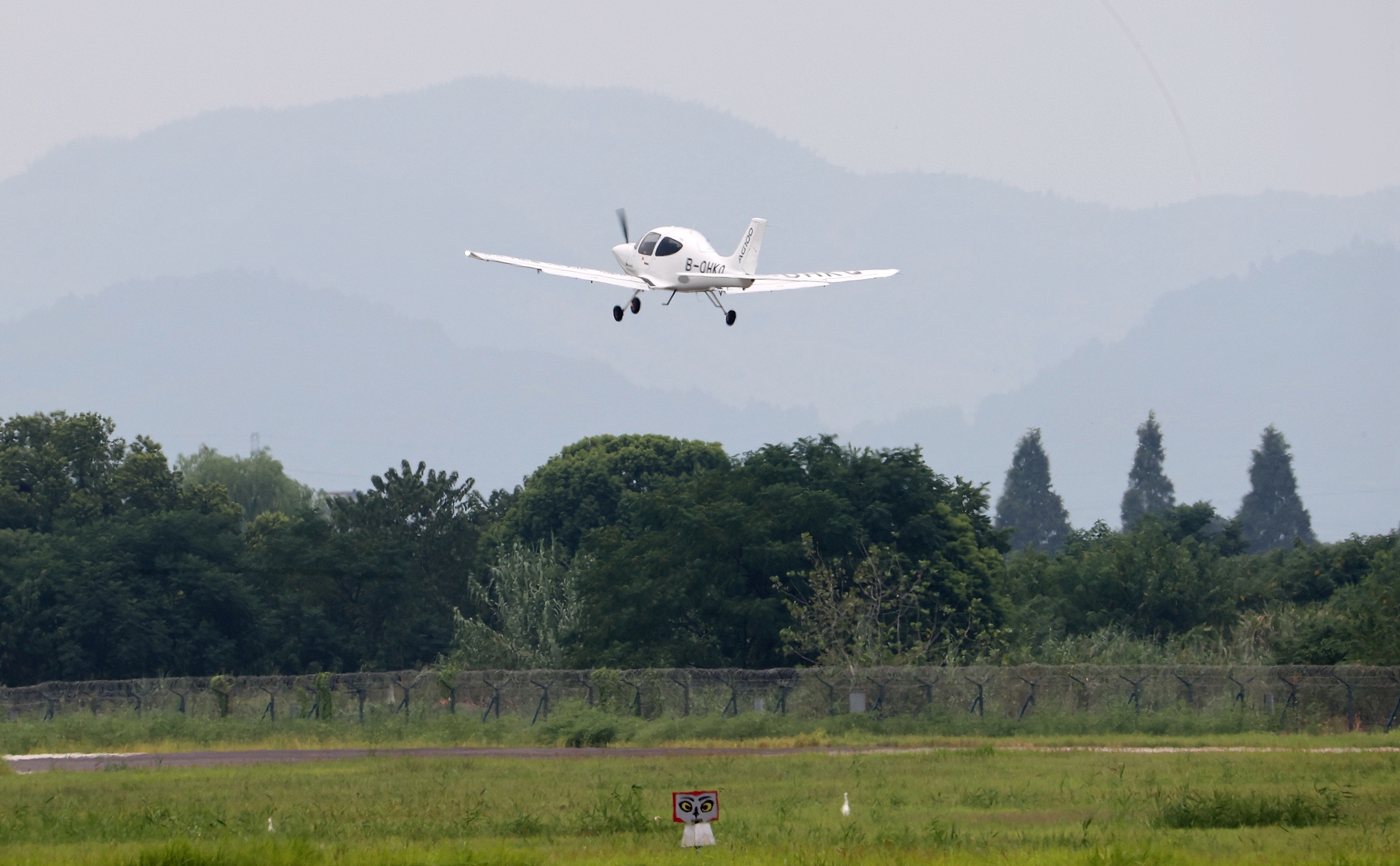 An AG100 civil primary trainer aircraft during flight tests at Moganshan Airport in Deqing County, Zhejiang Province, China, August 13, 2024. /CFP