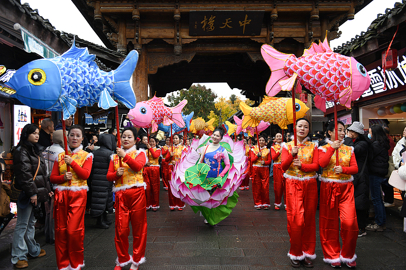 A variety of folk activities are held in Langzhong Ancient Town in Langzhong City, Sichuan Province on December 7, 2024. /CFP