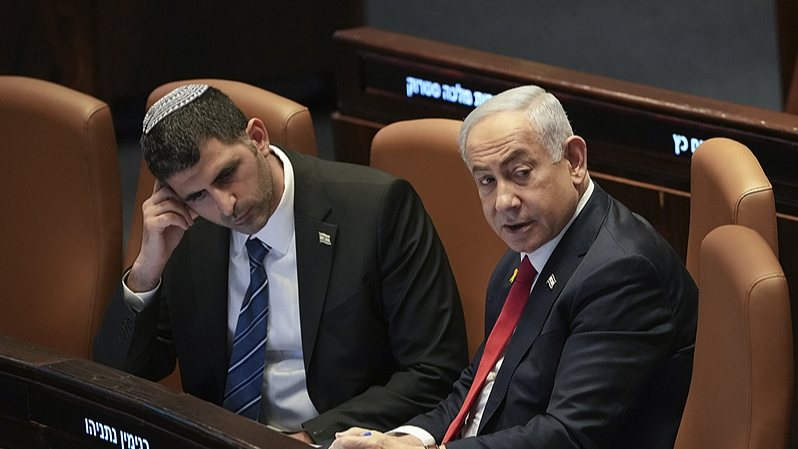 Israel's Prime Minister Benjamin Netanyahu (R) attends a session of the Knesset, Israel's parliament, in Jerusalem, November 18, 2024. /CFP