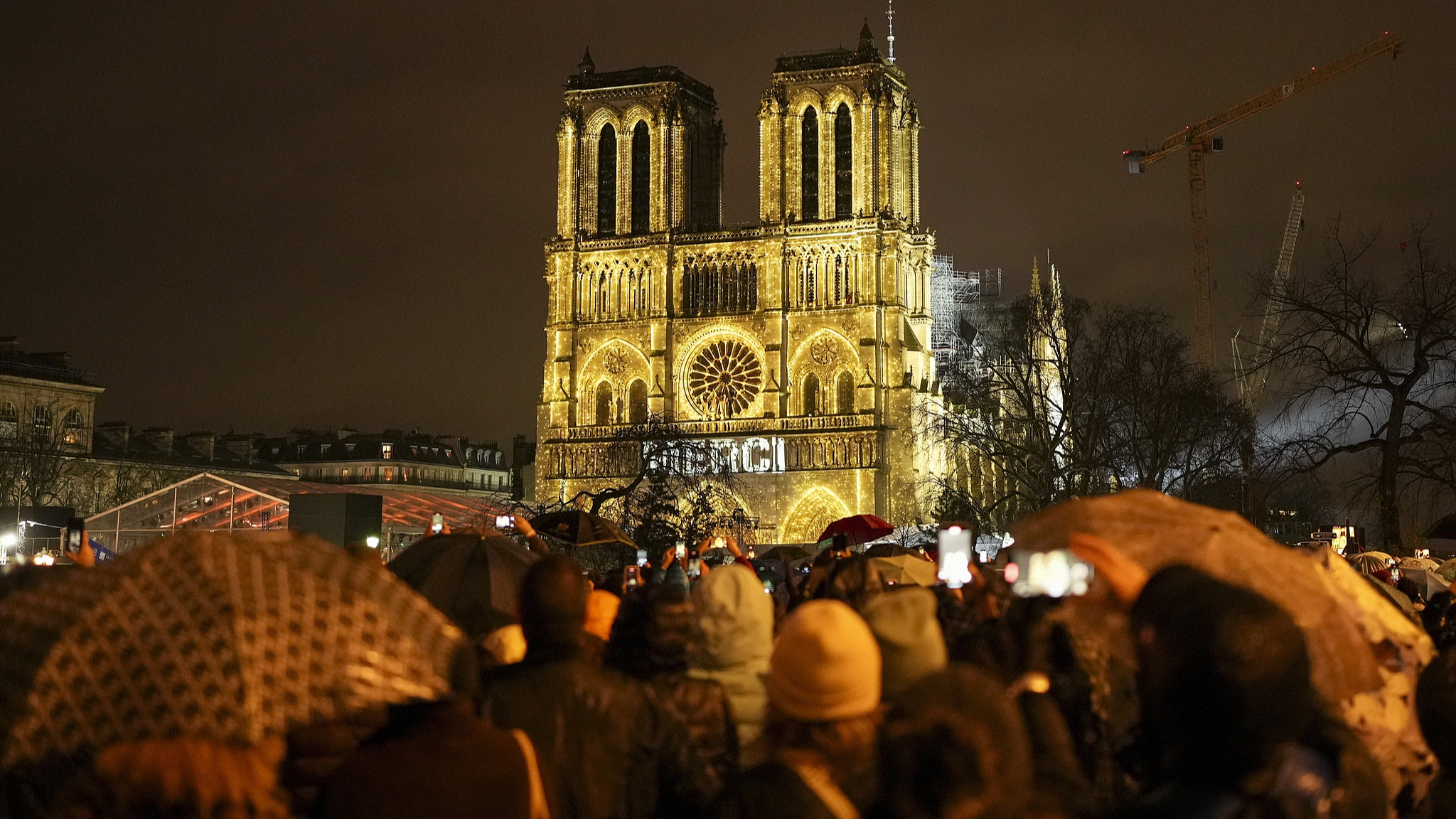 Spectators gather outside France's iconic Notre-Dame cathedral for its formal reopening in Paris, France, December 7, 2024. /CFP