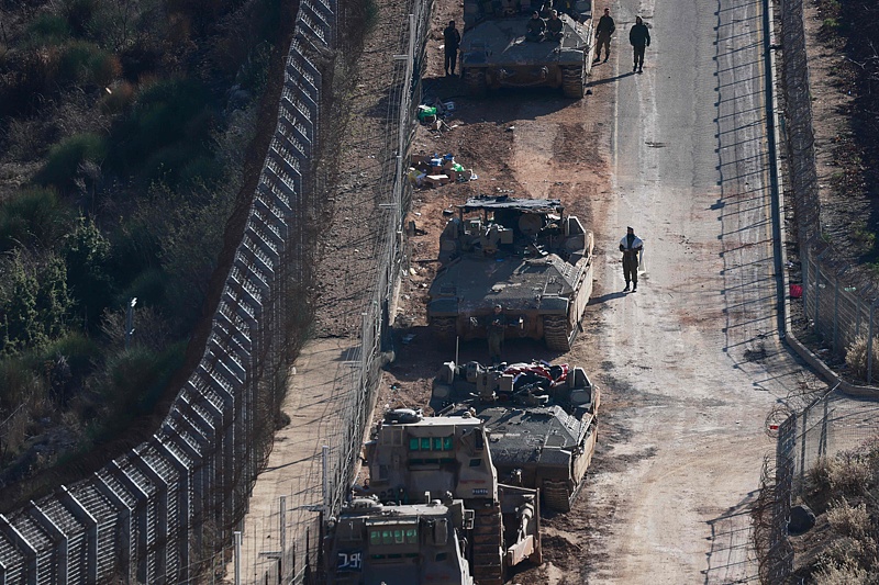 Israeli tanks and armoured vehicles line up the area outside the Druze village of Majdal Shams on the fence with the buffer zone between Syria and Israel December 9, 2024. /CFP