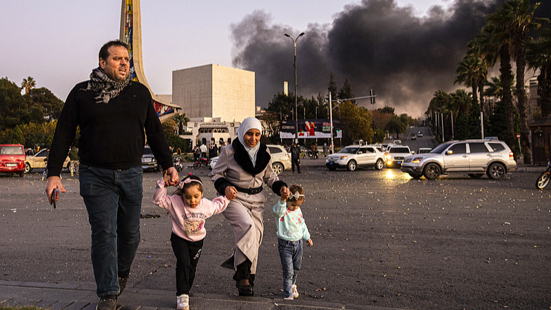 People walk on a street in Damascus, Syria, December 8, 2024. /CFP