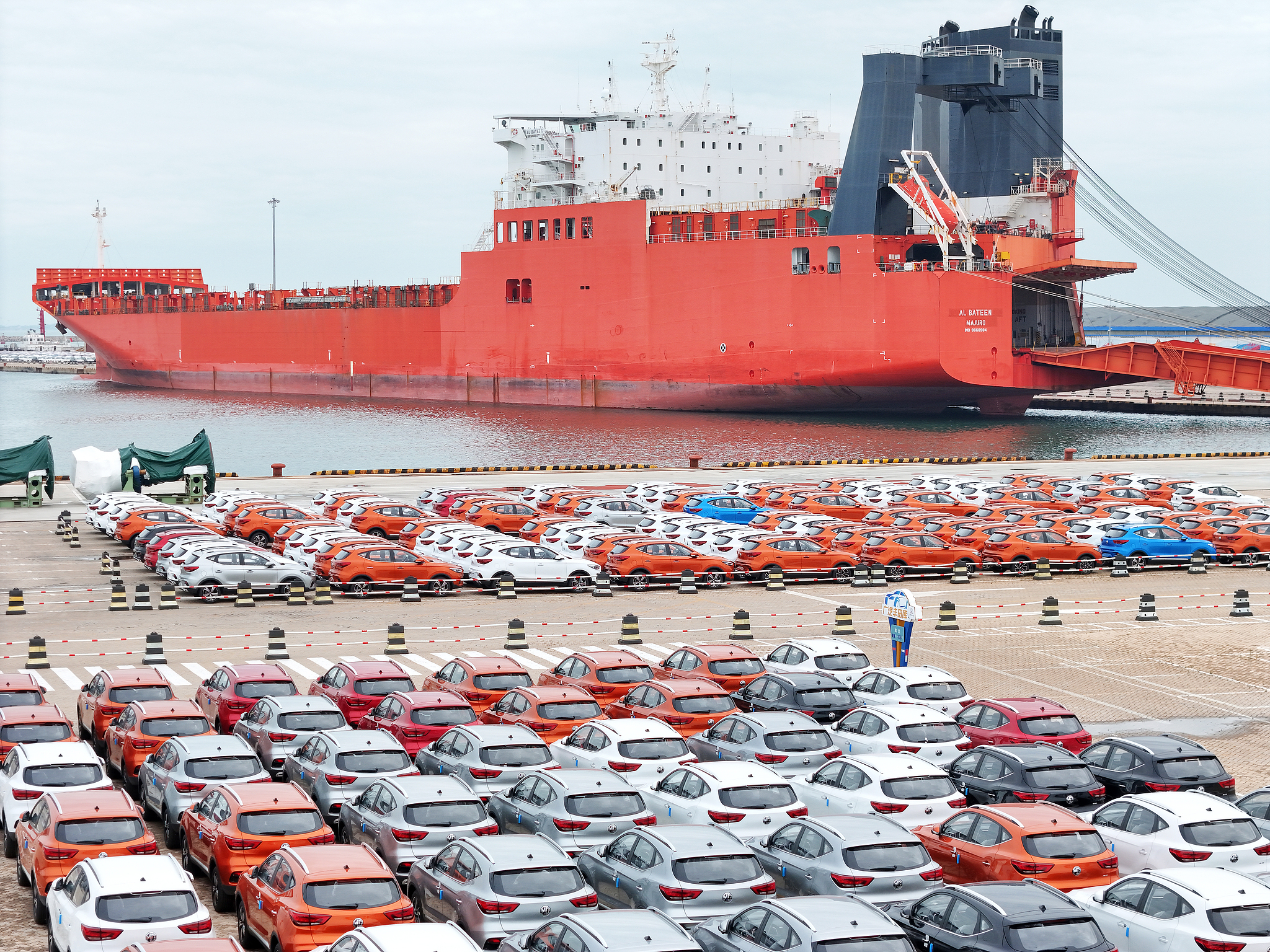 China-produced cars waiting to be loaded onto ships for export at the Yantai port in Shangdong Province, on October 21, 2024. /CFP