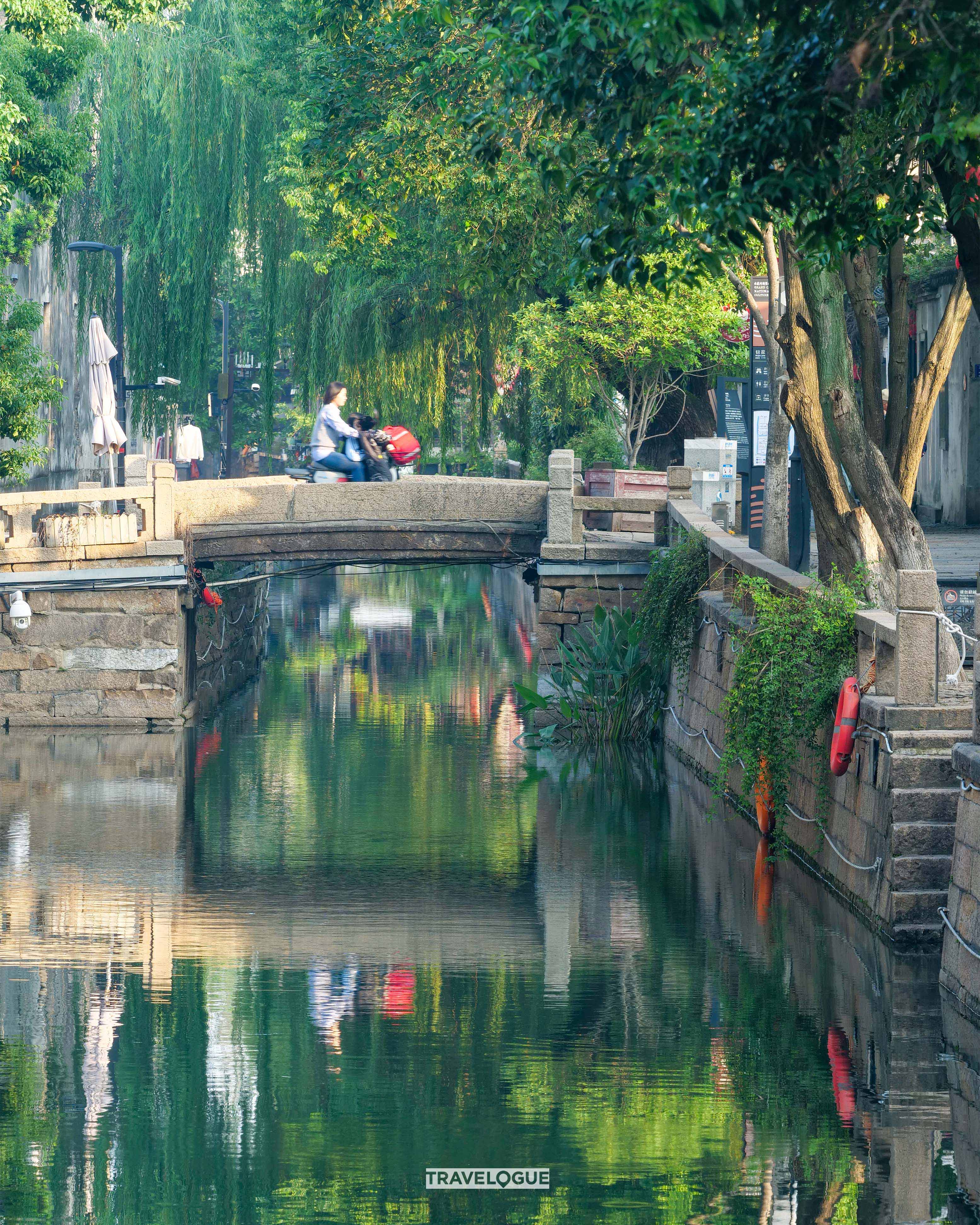 A photo shows the daily life of locals living along the canals in the old quarter of Suzhou, Jiangsu Province. /CGTN