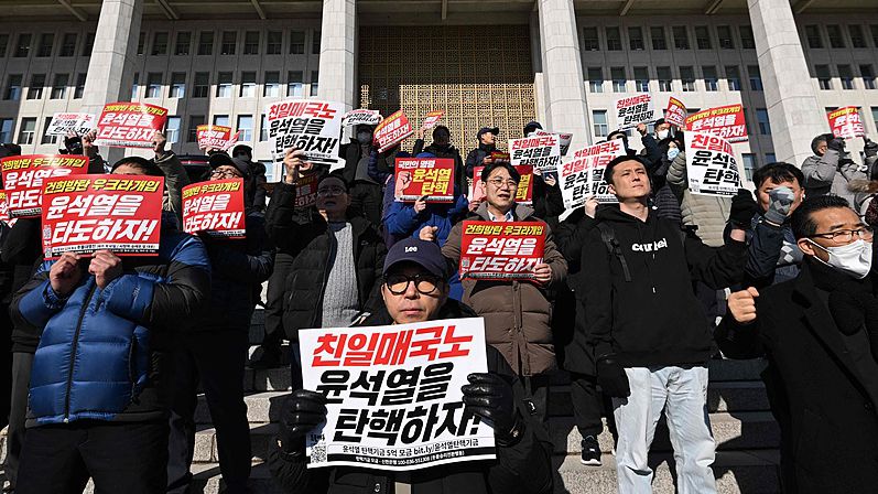 Live: Protesters gather in front of parliament in Seoul against President Yoon