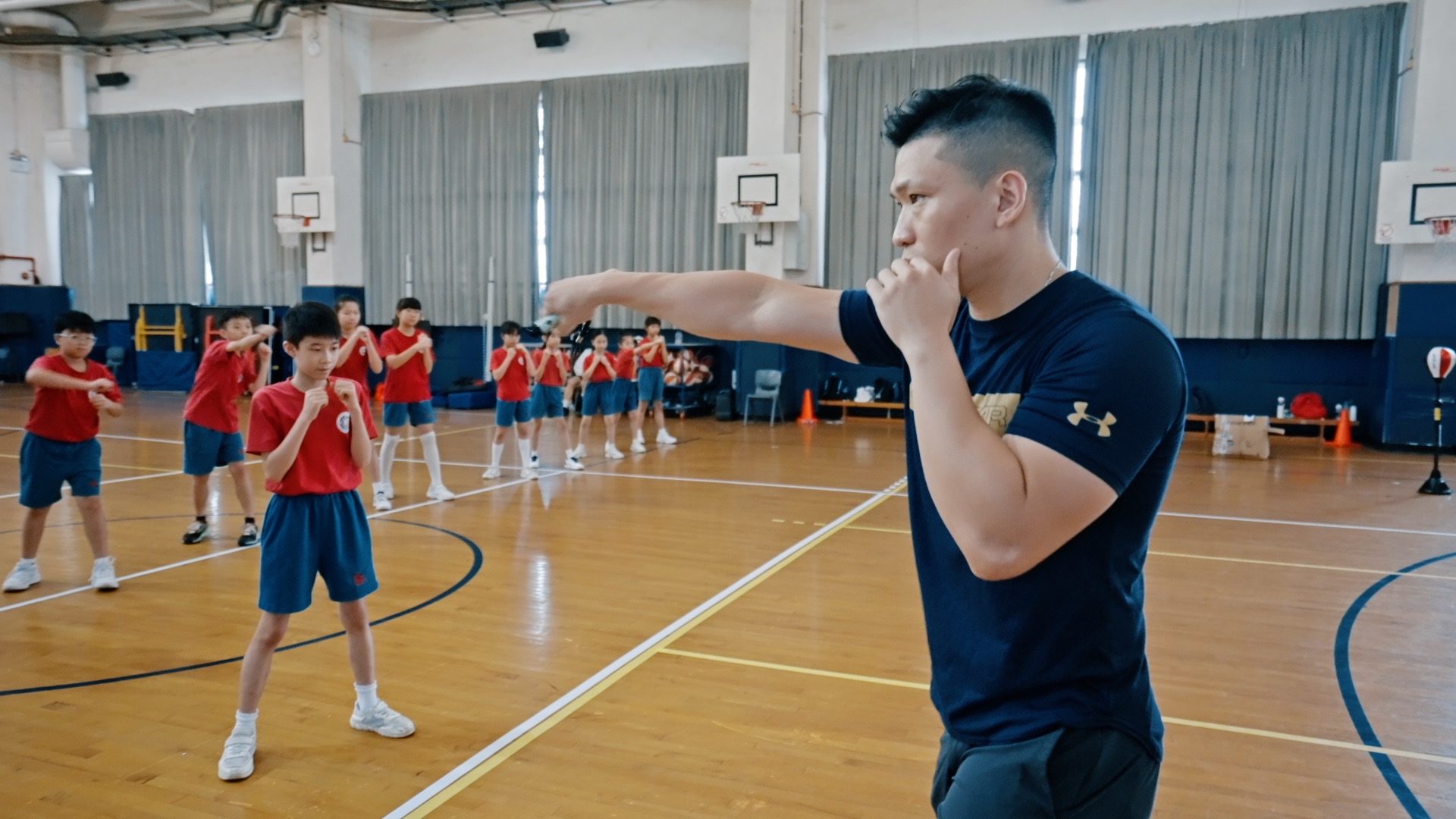 Three generations chase boxing glory in Macao