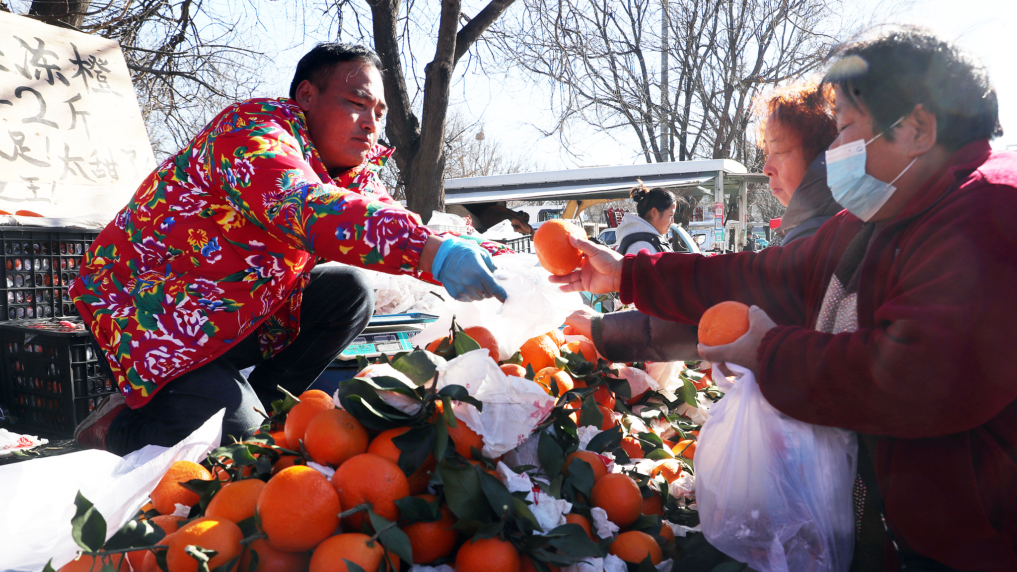 Buns, balloons and beddings: Rural open-air market in Beijing