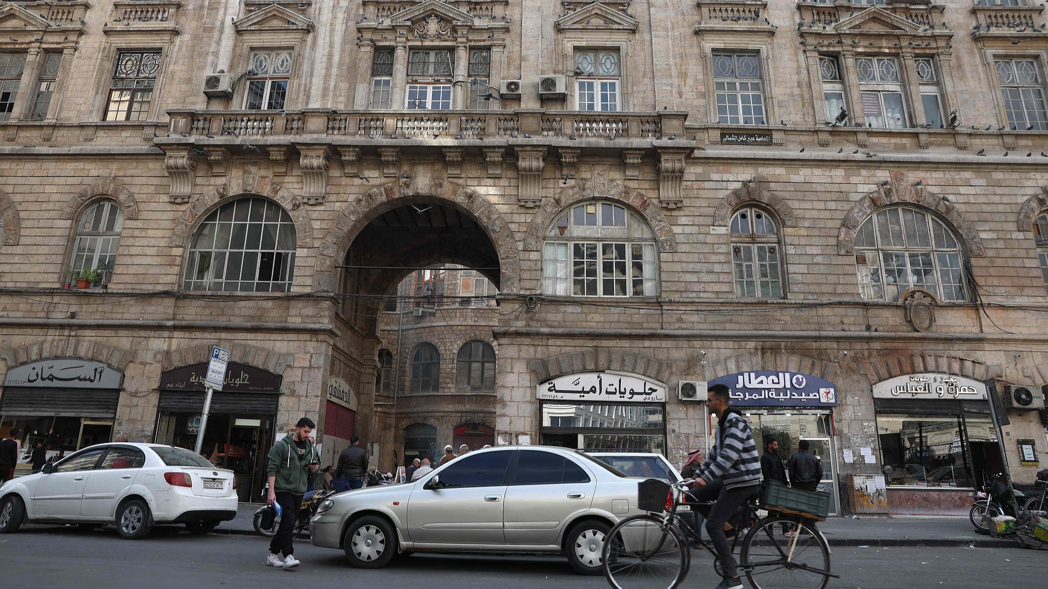 A man rides his bicycle on a street in Damascus, Syria, December 12, 2024. /CFP