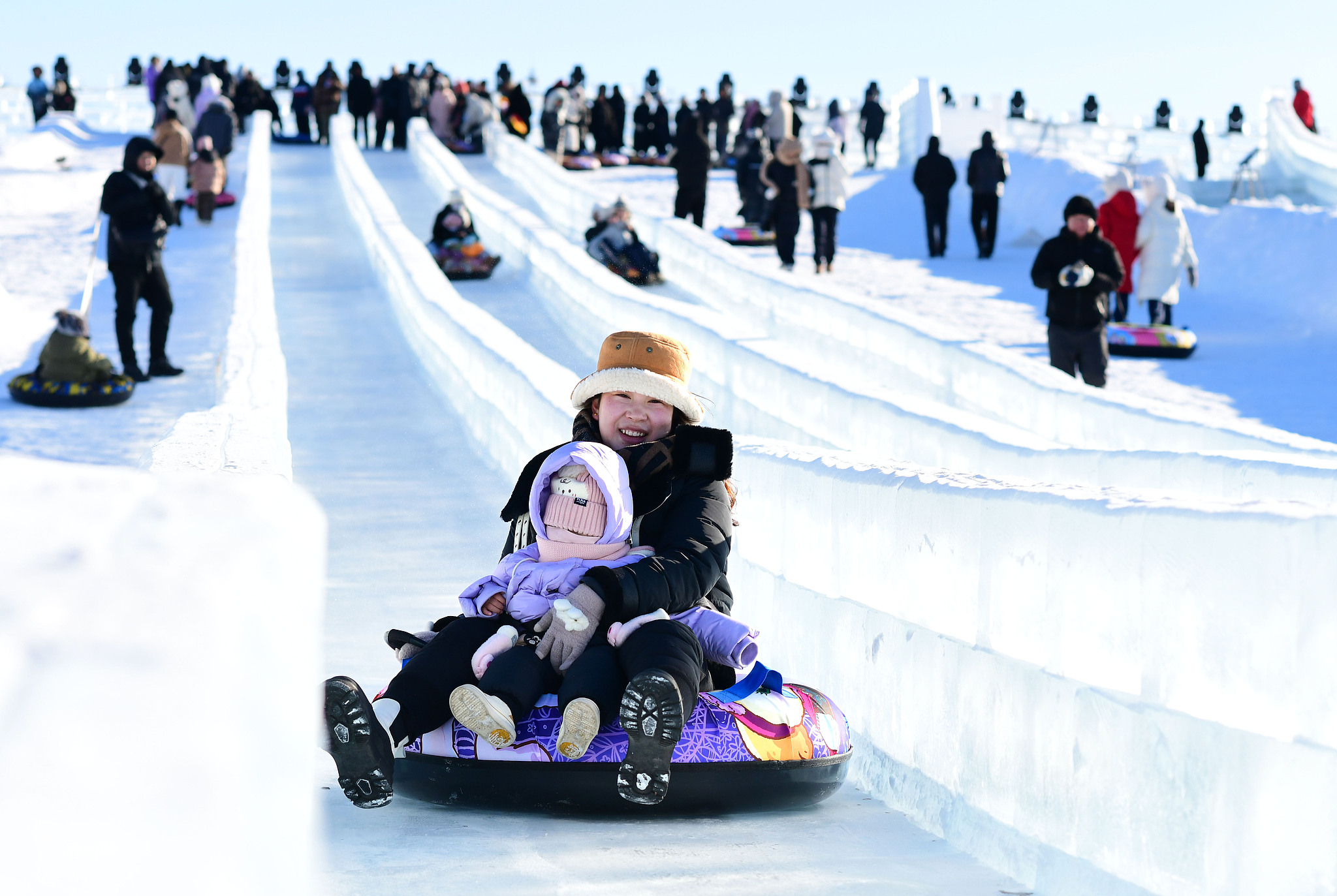 Visitors experience ice and snow sports in Hulun Buir, north China's Inner Mongolia Autonomous Region, December 12, 2024. /CFP