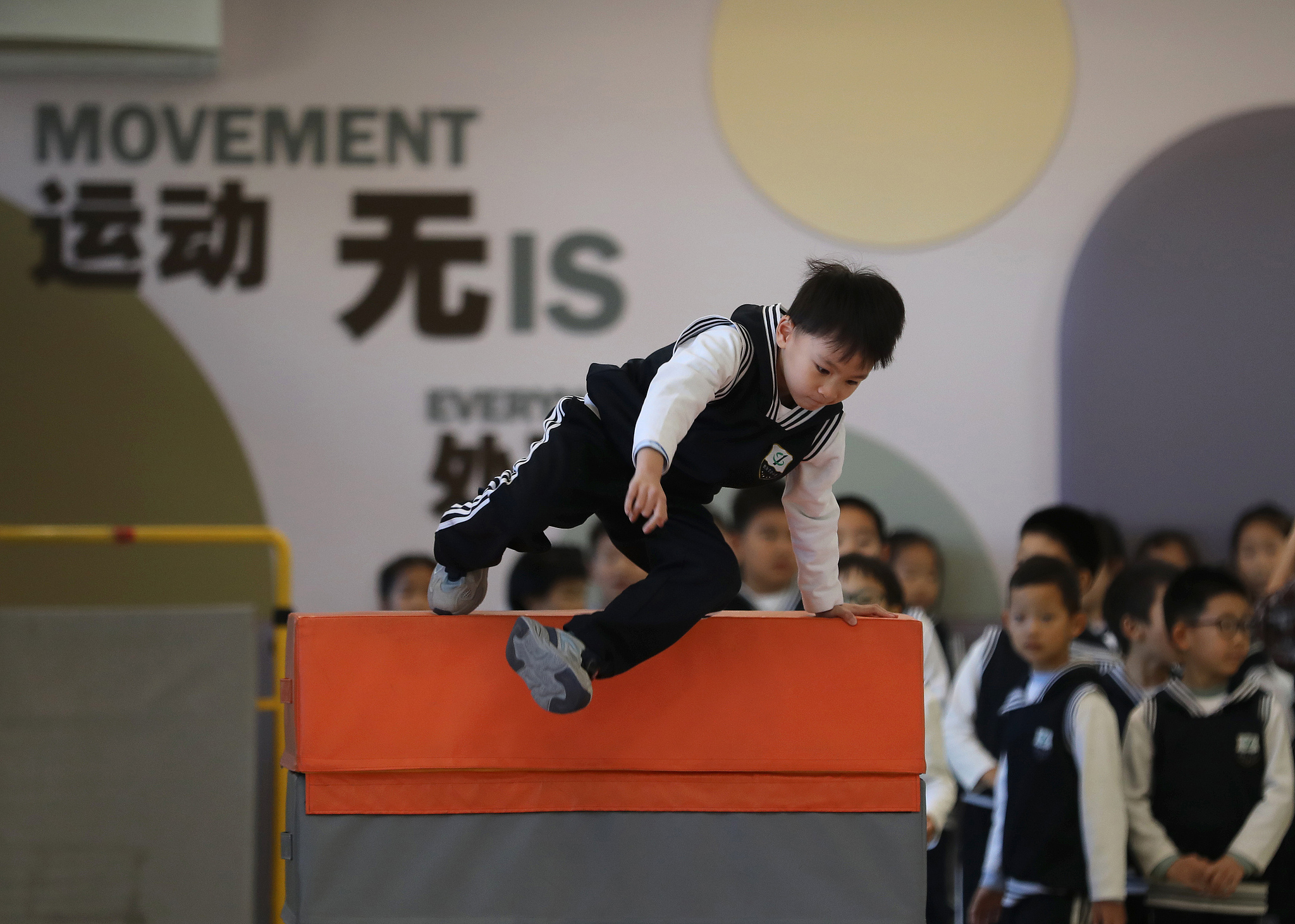 A schoolchild learns parkour at the Beijing Chaoyang District Experimental Primary School, Beijing, November 21, 2024. /CFP