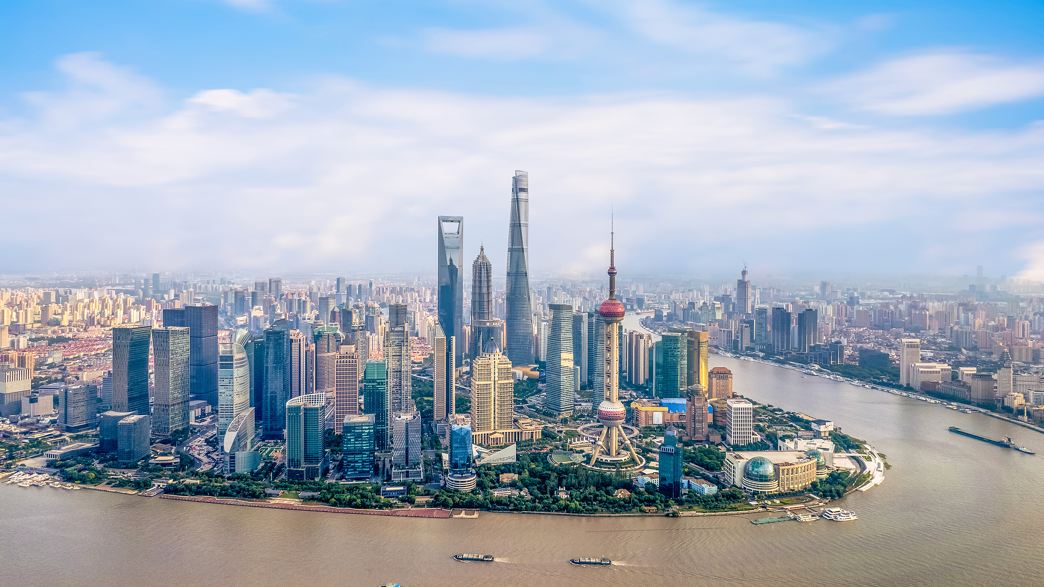 An aerial view of the architecture along both sides of the Huangpu River with the iconic Bund skyline in Shanghai, China. /CFP