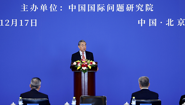 Member of the Political Bureau of the Communist Party of China Central Committee and Foreign Minister Wang Yi speaks at a foreign policy symposium in Beijing, December 17, 2024. /Chinese Foreign Ministry