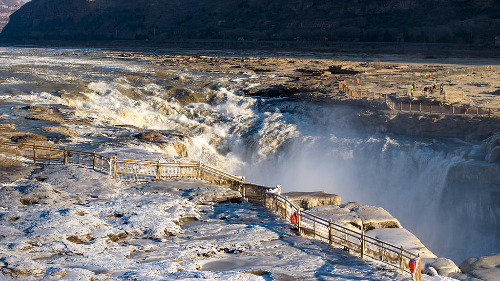 A photo taken on December 16, 2024 shows a distant view of the Hukou Waterfall seen from Yan'an, Shaanxi Province, China. /CFP