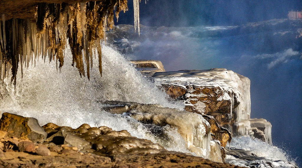 Ice and roaring waters at Hukou Waterfall