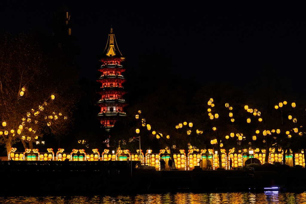 Installations for the 39th Qinhuai Lantern Festival light up Bailuzhou Park in Nanjing, Jiangsu Province, on December 15, 2024. /CFP   