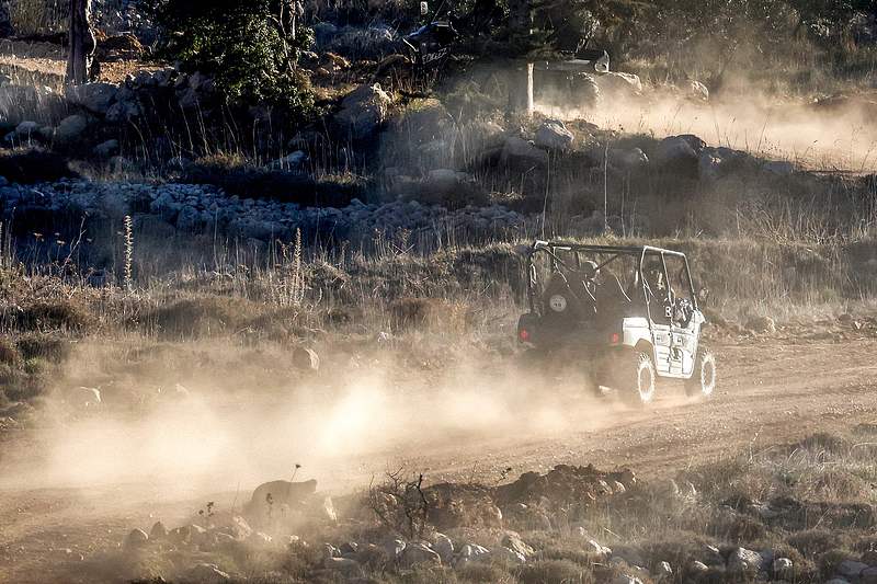 An Israeli army vehicle moves along a dirt road in the UN-patrolled buffer zone that separates Israeli and Syrian forces in the Golan Heights, December 17, 2024. /CFP