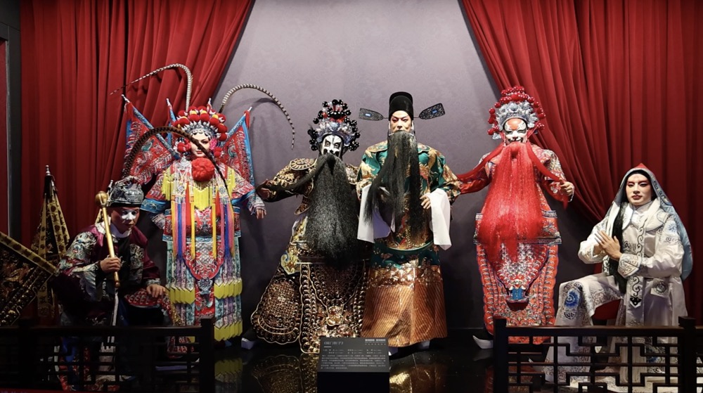 A picture of wax figures of the famous characters in Qinqiang Opera with the four roles of 