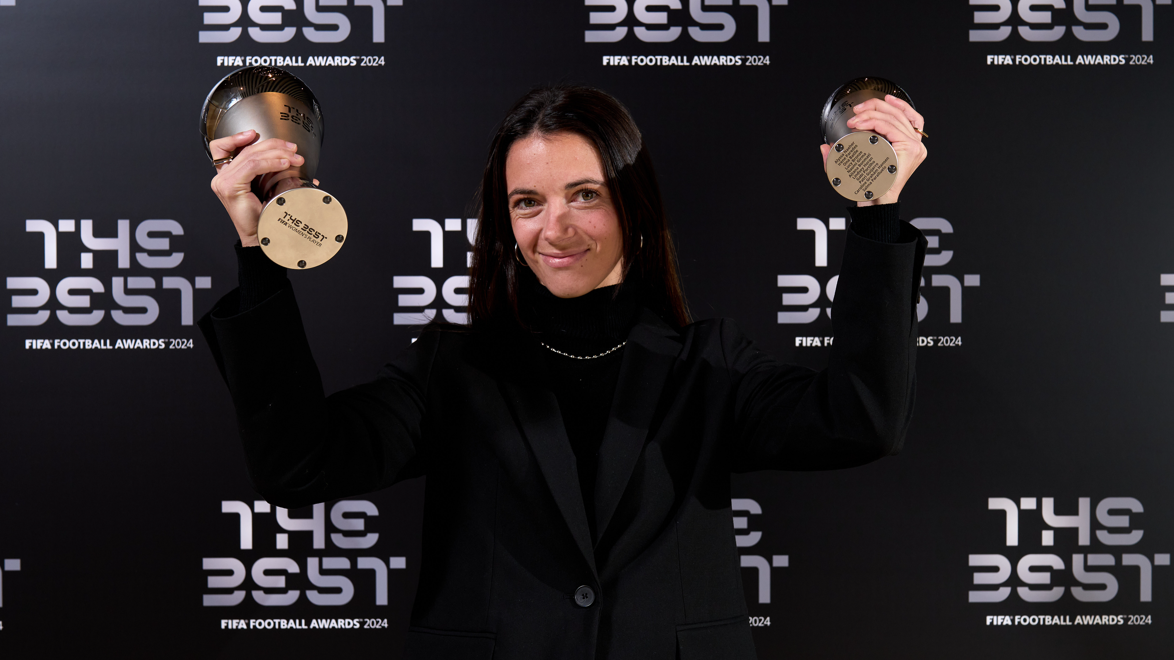 Aitana Bonmati of FC Barcelona poses with her The Best FIFA Women's Player Award and The Best FIFA Women's 11 Award trophies at Estadi Olimpic Lluis Companys in Barcelona, Spain, December 17, 2024. /CFP