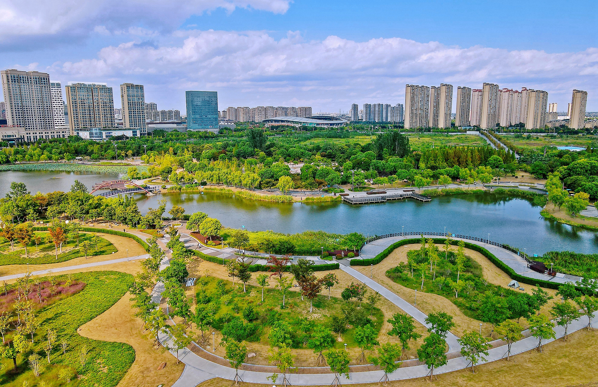 A view of an ecological park integrated with urban buildings in the new district of Rugao City, Nantong, Jiangsu Province, China, October 3, 2024. /CFP