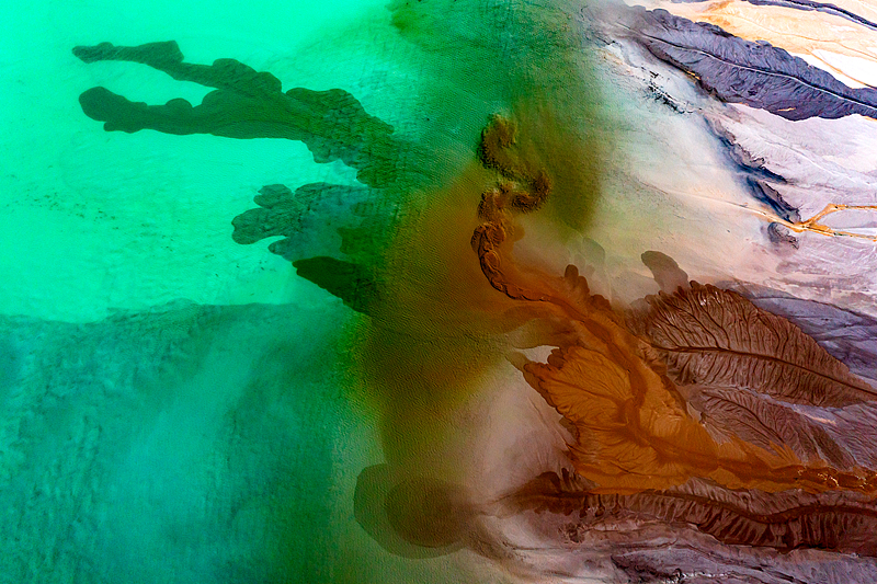 A photo shows colorful views of a tailing dam in Huangshi, Hubei Province, December 14, 2024. /CFP