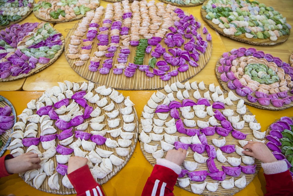 An undated photo shows an assortment of colorful dumplings. /IC