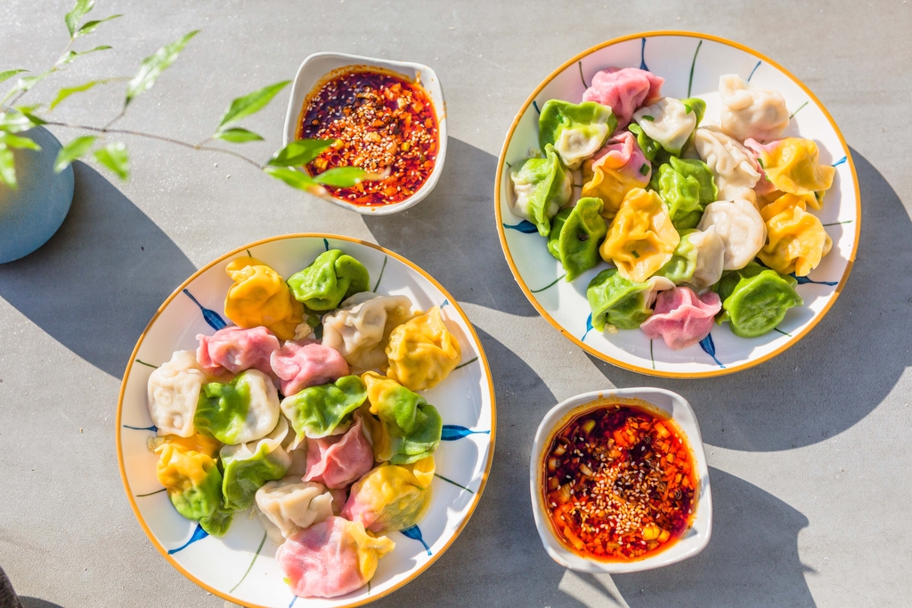 An undated photo shows an assortment of colorful dumplings. /IC