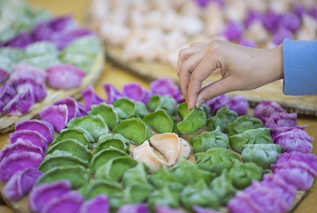 An undated photo shows an assortment of colorful dumplings. /IC