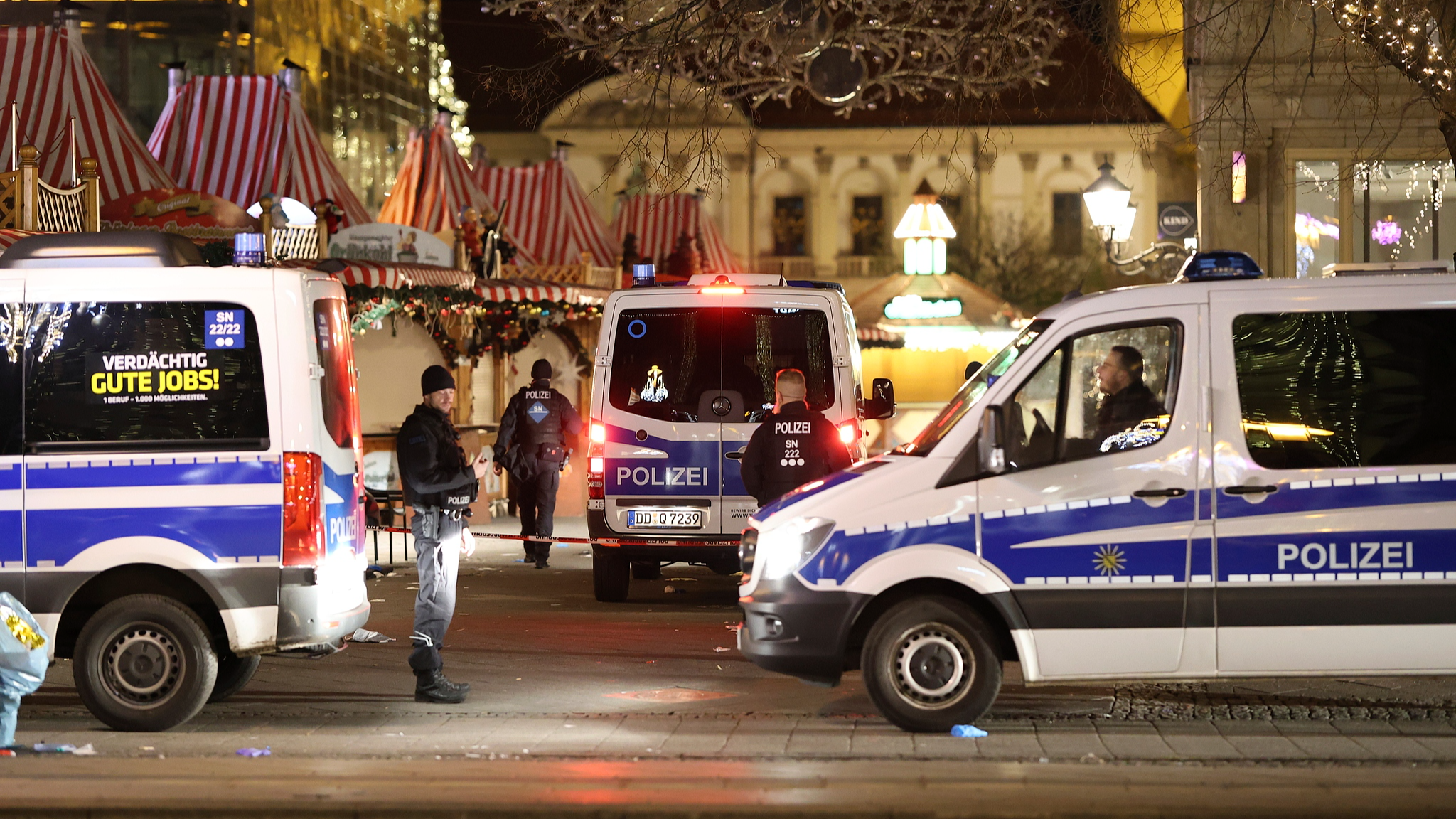 Police officers and police emergency vehicles are seen at the Christmas market in Magdeburg, Germany, December 21, 2024. /CFP