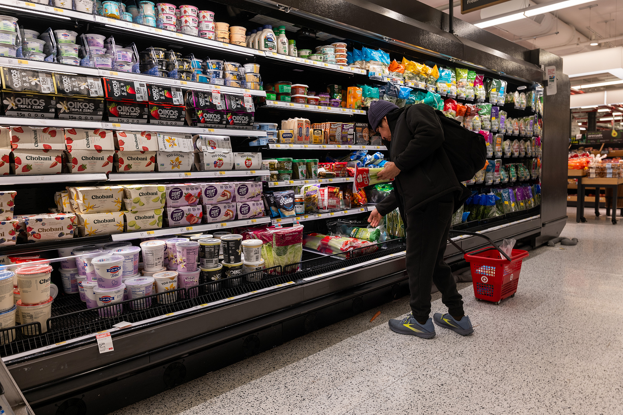 A customer shops at a Whole Foods Market grocery store in New York City, United States, December 17, 2024. /CFP