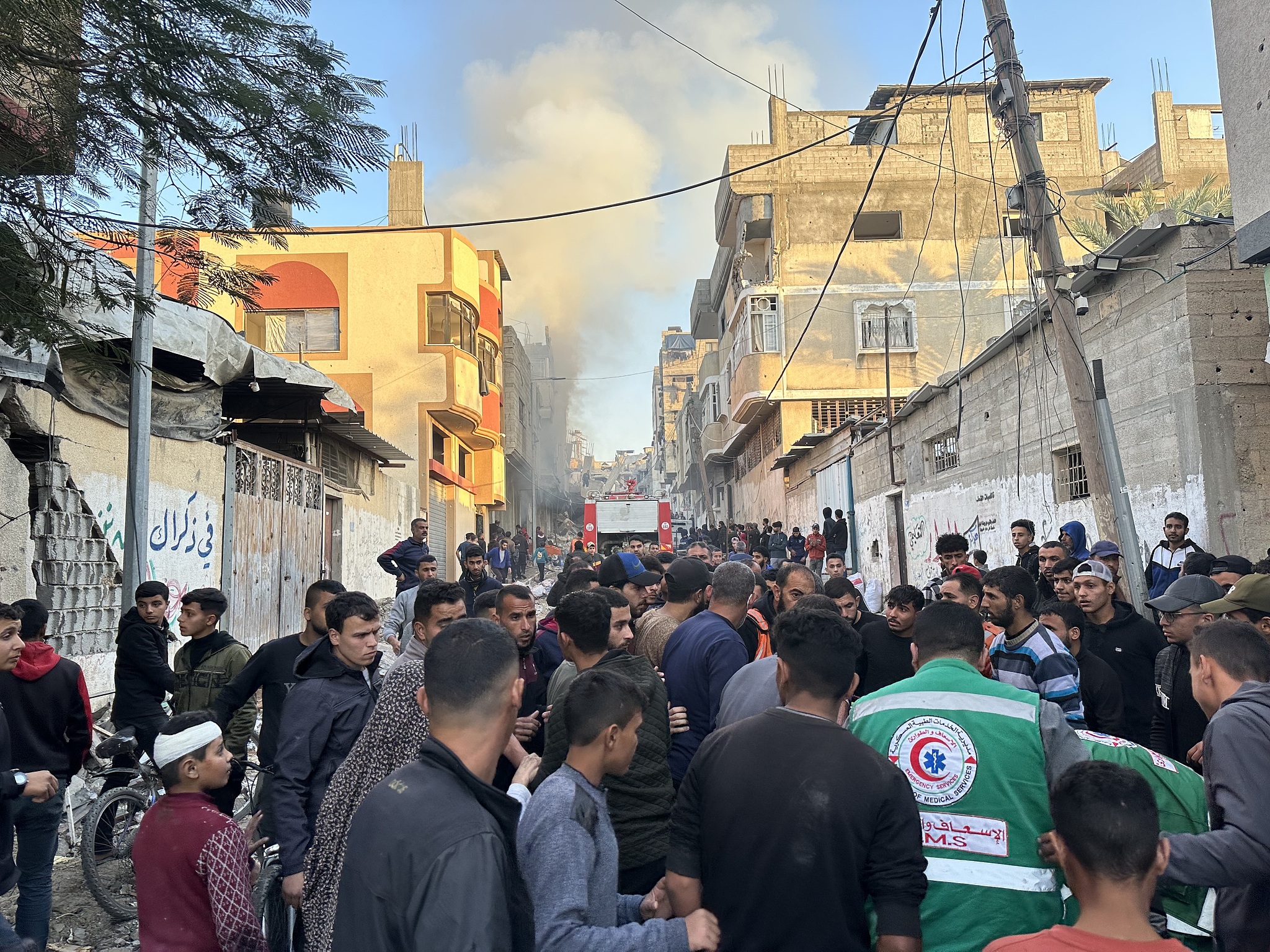 Fire brigades try to extinguish the fire that broke out in the building targeted by the Israeli army in Gaza City, Gaza Strip, December 19, 2024. /CFP