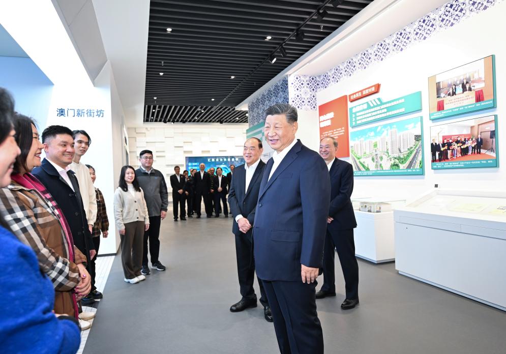 Chinese President Xi Jinping talks with Macao residents living in Hengqin during an inspection of Guangdong-Macao In-Depth Cooperation Zone in Hengqin, south China's Guangdong Province, December 19, 2024. /Xinhua