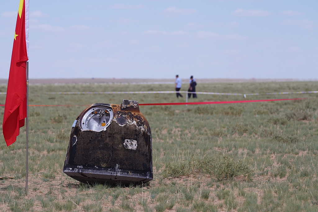 The return capsule of the Chang'e-6 probe lands in the designated area in Siziwang Banner, north China's Inner Mongolia Autonomous Region, June 25, 2024. /CFP