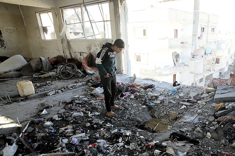 Palestinians inspect the damage following an Israeli army attack on a school housing displaced families belonging to the UNRWA in Khan Yunis, Gaza, Gaza Strip, Palestinian territory, December 16, 2024. /CFP