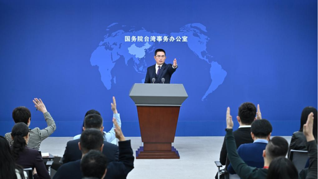 Chen Binhua, a spokesperson for the State Council Taiwan Affairs Office, gestures at a press conference in Beijing, China, December 25, 2024. /Xinhua