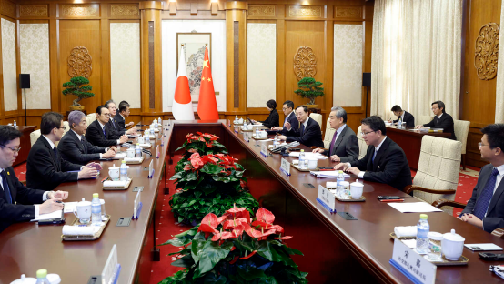 Wang Yi holds talks with Takeshi Iwaya in Beijing, China, December 25, 2024. /Chinese Foreign Ministry