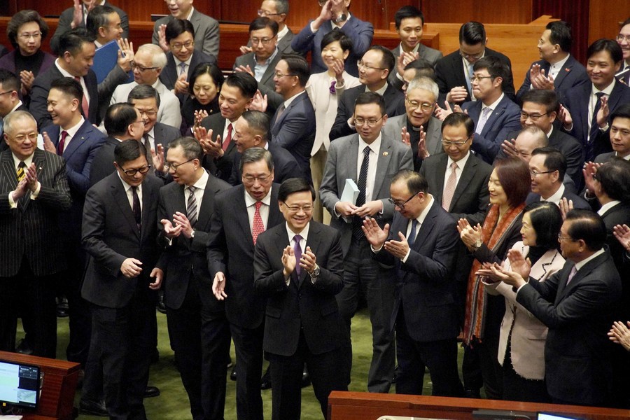 The Legislative Council (LegCo) of the Hong Kong Special Administrative Region (HKSAR) passes the safeguarding national security bill in a unanimous vote during the third reading in Hong Kong, south China, March 19, 2024. /Xinhua