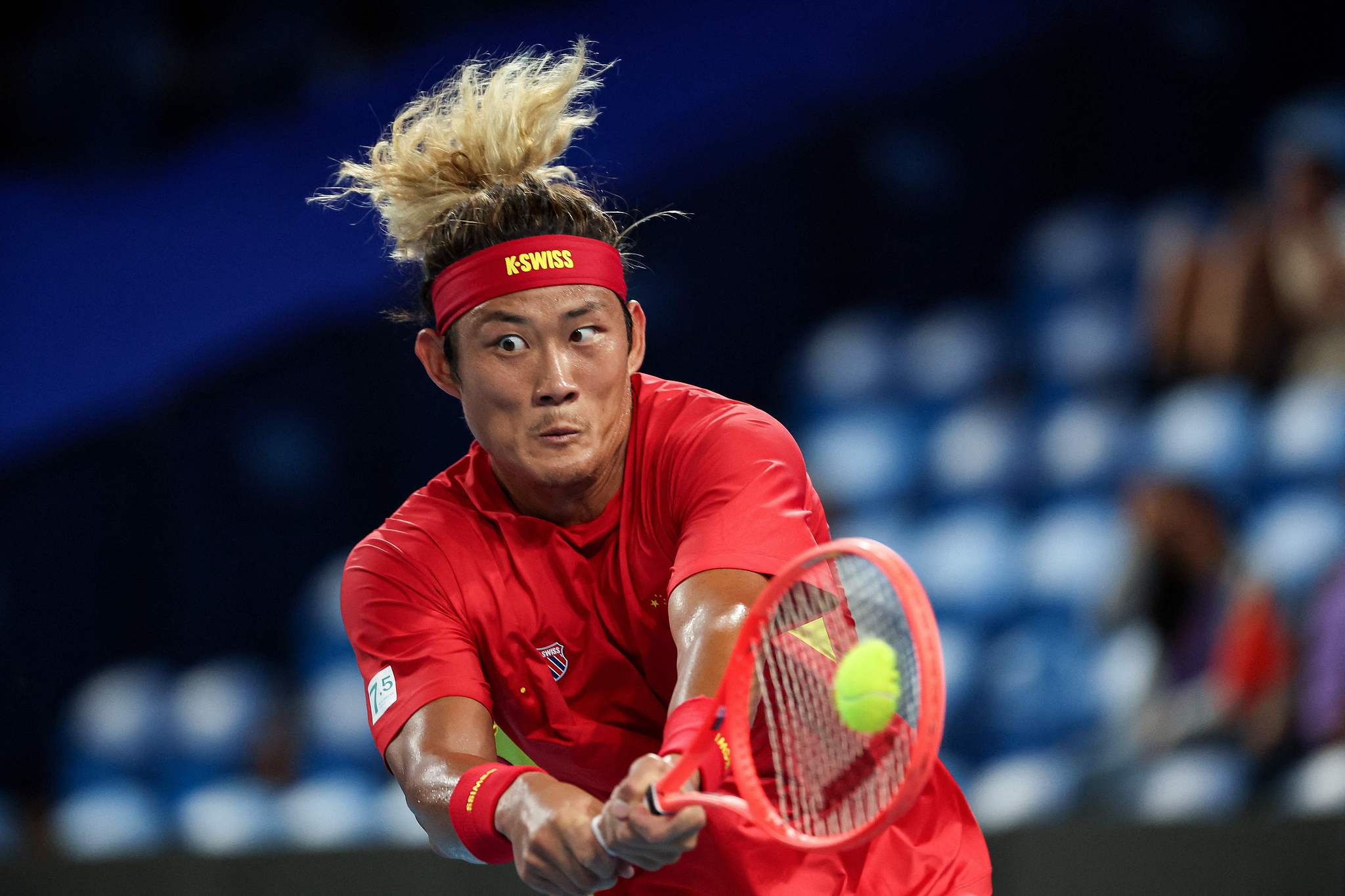 Zhang Zhizhen of China hits a shot against Thiago Monteiro of Brazil in a men's singles match at the United Cup in Perth, Australia, December 27, 2024. /CFP