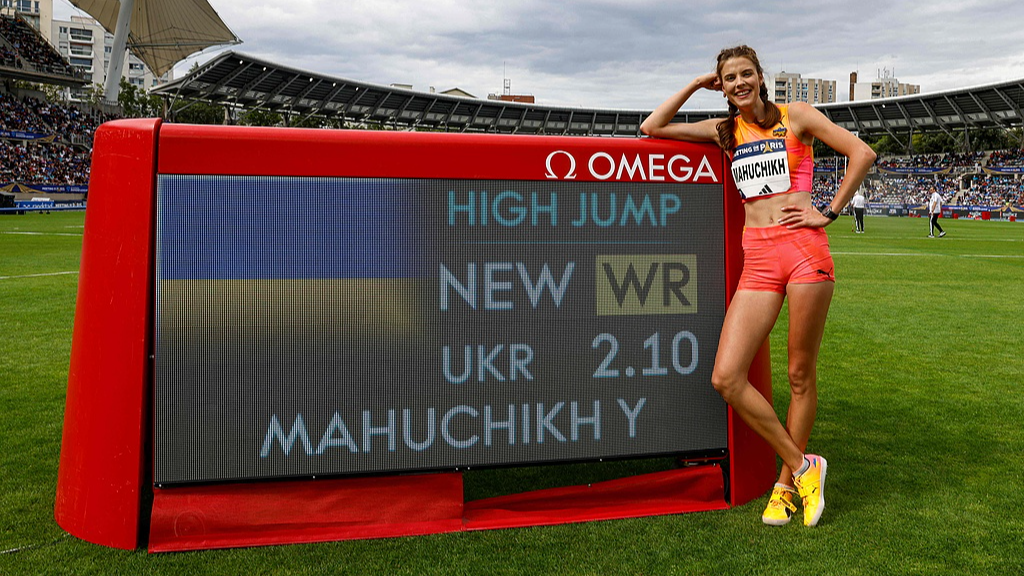 Yaroslava Mahuchikh poses after beating a world record in the women's high jump event during the 