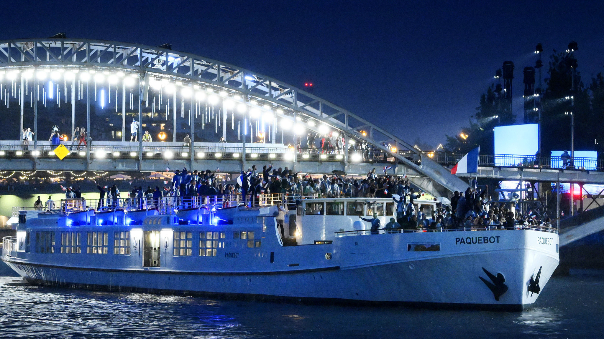 A boat carrying France's delegation cruises on the Seine River during the opening ceremony of the Paris Olympics, Paris, France, July 26, 2024. /CFP