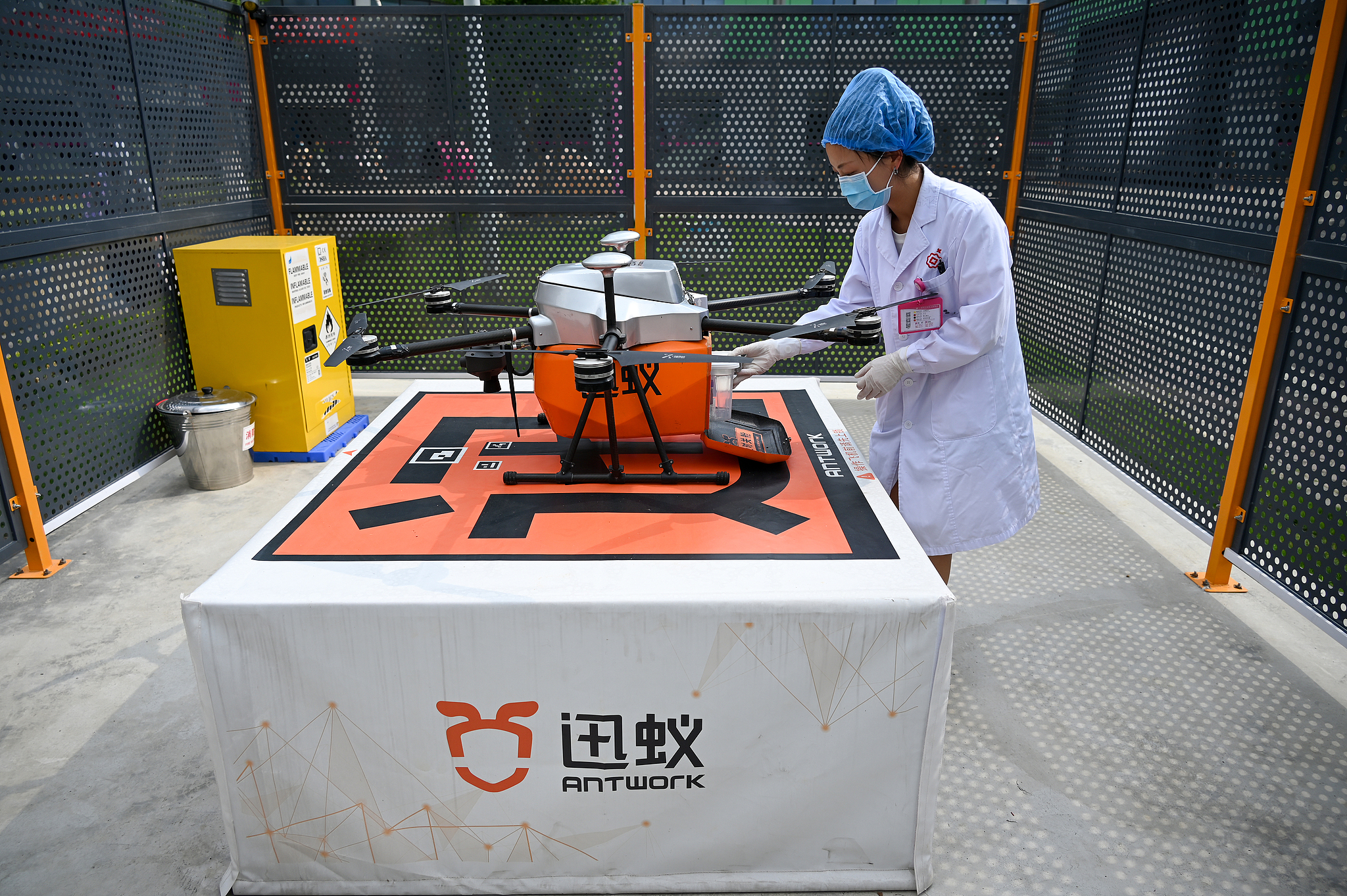 A medical staff member operates a drone at a logistics center in Chengdu Women and Children's Central Hospital, western China's Sichuan Province, June 25, 2024. /CFP