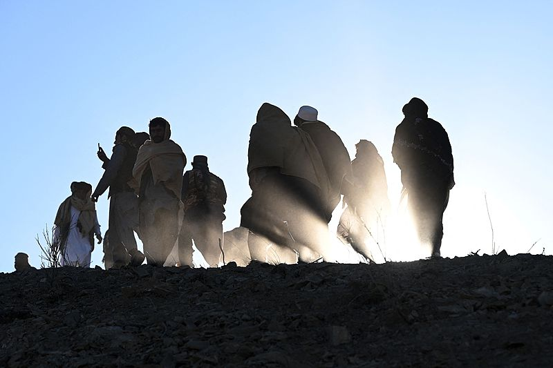 Afghan men leave after attending the funeral of Khalil-ur-Rahman Haqqani, the minister for refugees and repatriation, in Sarana of Paktia province, south of Kabul, December 12, 2024. /CFP