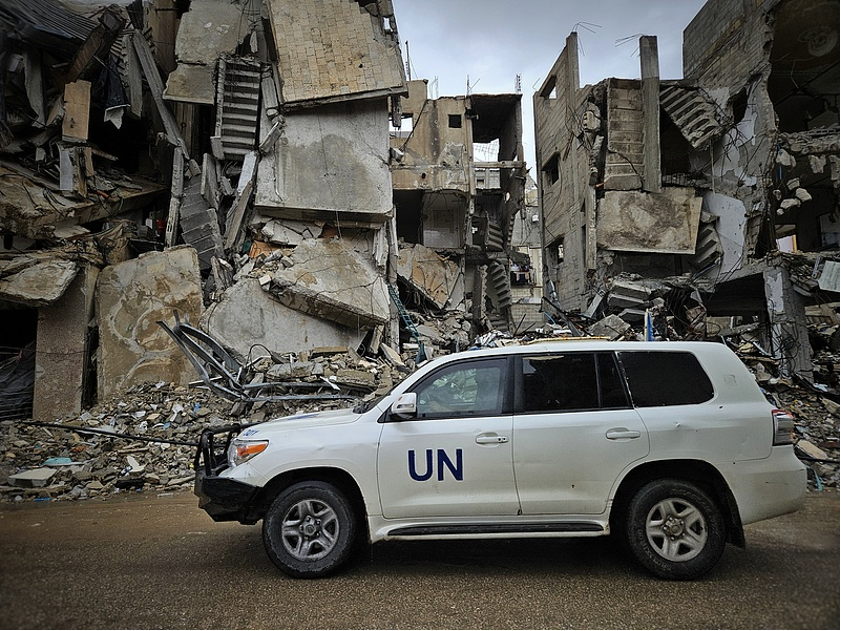 UN vehicle drives past rubble as Palestinian families, forcibly displaced by the Israeli army and taking refuge at tent camps in Khan Yunis, struggle due to harsh weather conditions amid the ongoing Israeli attacks in Khan Yunis, Gaza. November 24, 2024. /CFP