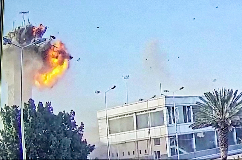 This grab taken from footage released by Al-Masirah TV station of Yemen's Houthis on December 28, 2024 shows the moment an Israeli strike hit the control tower of Sanaa International Airport. /CFP