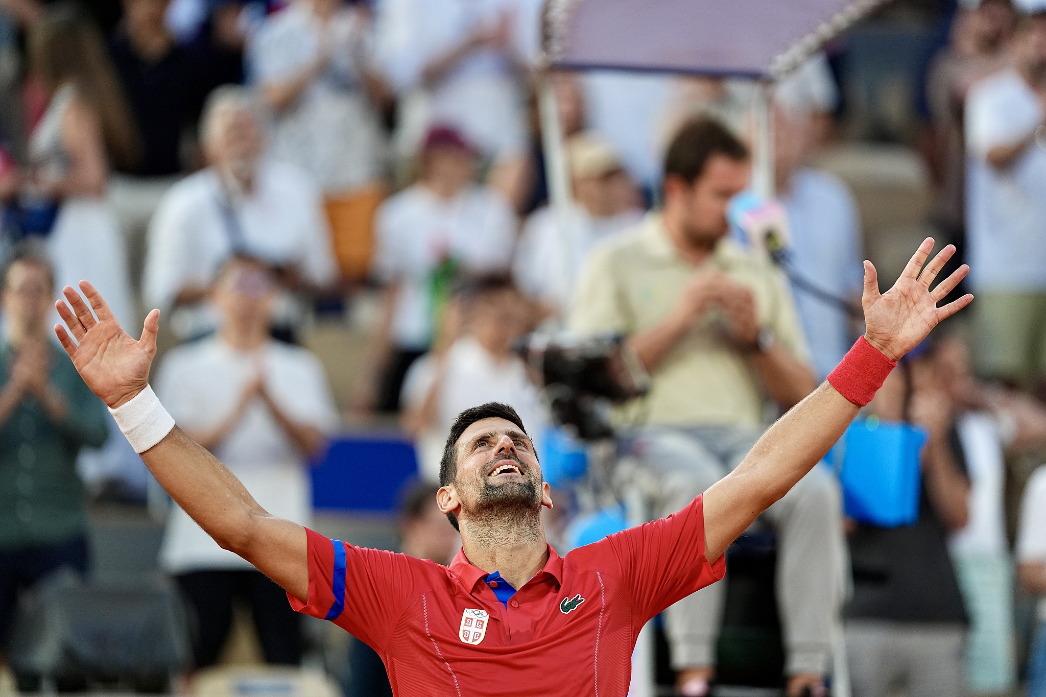 Serbia's Novak Djokovic reacts after defeating Spain's Carlos Alcaraz in the men's singles tennis final at the Roland Garros Stadium during the Summer Olympics in Paris, France, August 4, 2024. /CFP