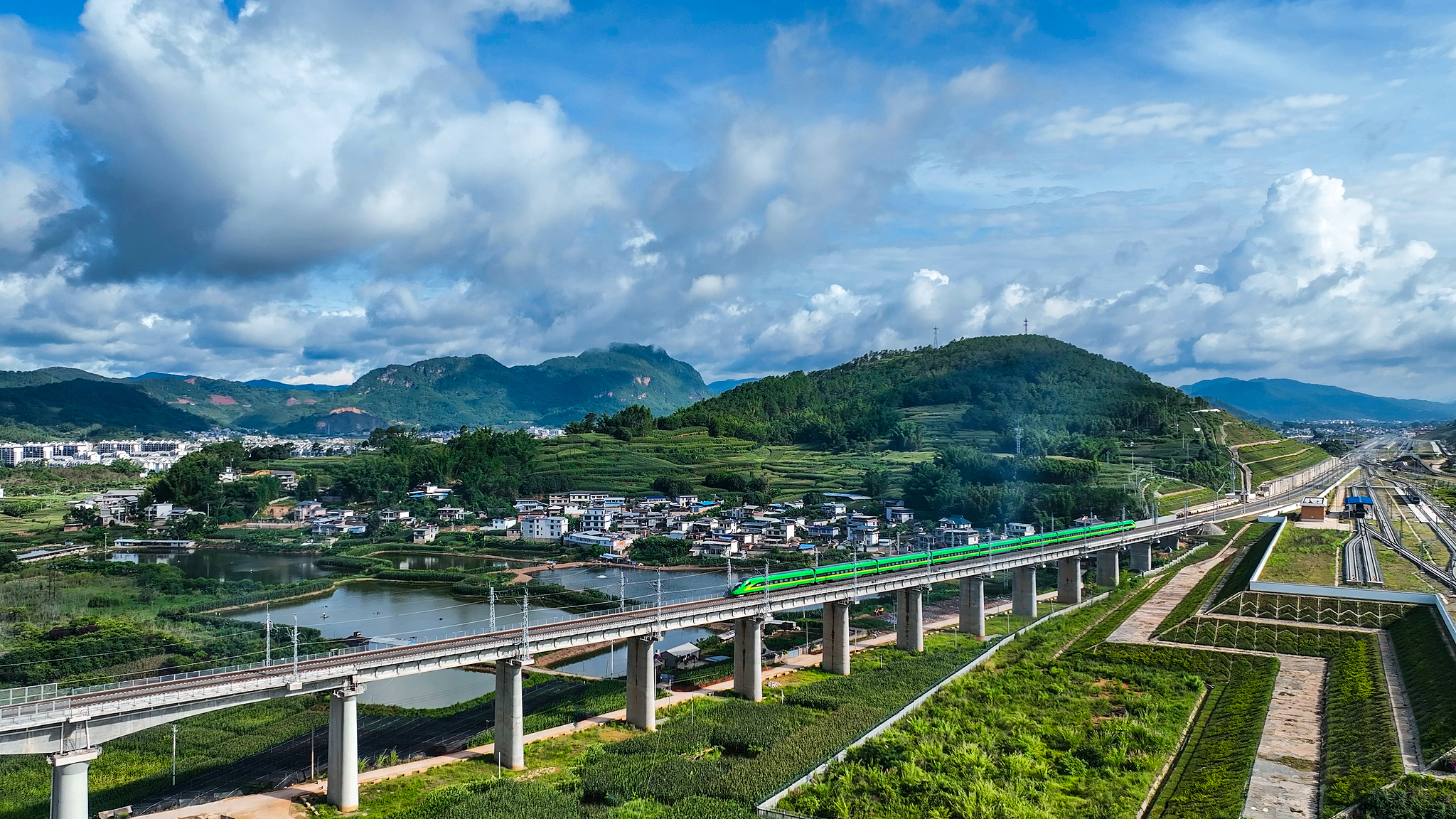 Scenic views along the China-Laos Railway as it winds through Pu'er city, Yunnan province, China, July 17, 2021. /CFP