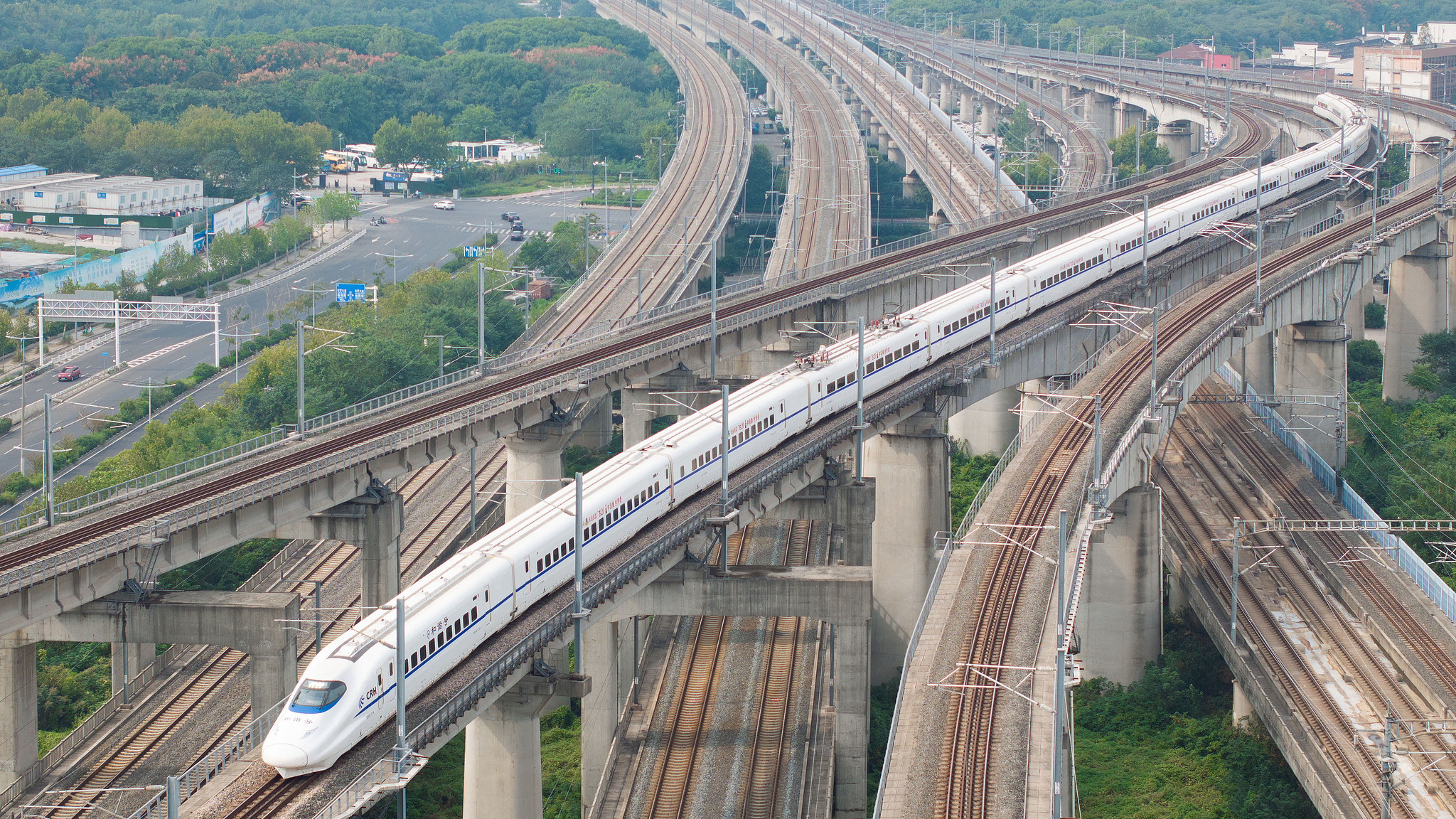 A high-speed train runs near Nanjing South Railway Station in Nanjing, east China