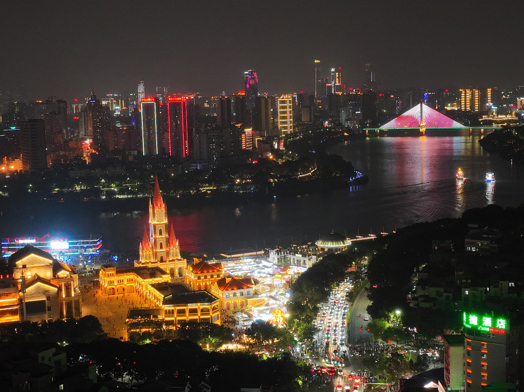 The Yongjiang River is seen from above at night in Nanning, Guangxi on May 20, 2023. /CFP