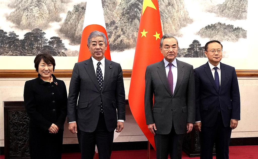 Japanese Foreign Minister Takeo Iwaya (2nd L) and Chinese Foreign Minister Wang Yi (2nd R) pose for a photo at the Great Hall of the People in Beijing, China, December 25, 2024. /CFP