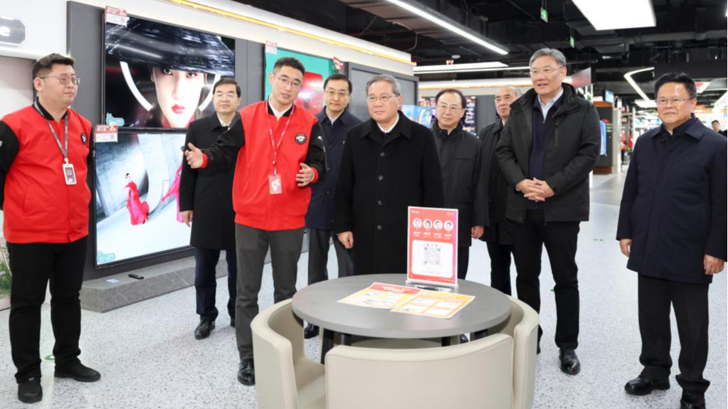 Chinese Premier Li Qiang, also a member of the Standing Committee of the Political Bureau of the Communist Party of China Central Committee, visits a home appliance store in Jinan, east China